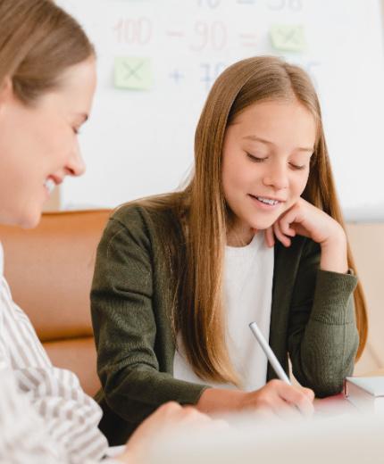 a tutor and elementary student tutoring